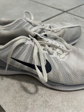 Nike White Mesh Sneakers with Black Swoosh Accent